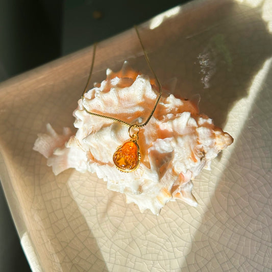 Amber Buddha Necklace